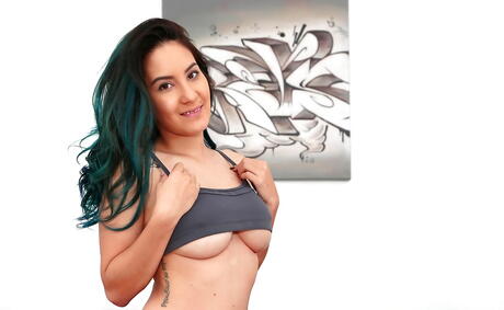 Lovely latina babe Aria Jade bares big boobs and spreads her legs 